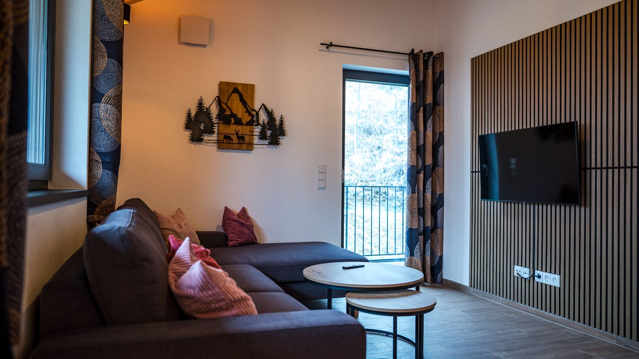 Wohnbereich mit Zugang zum Balkon Wohnbereich mit Zugang zum Balkon
